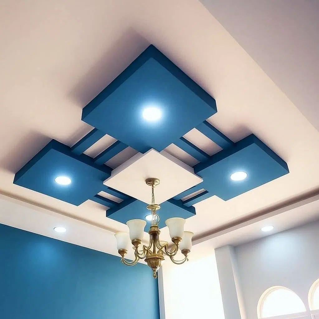 ديكور سقف جبس بورد مربع بتصميم حديث، يجمع بين اللون الأزرق والأبيض مع إضاءة سبوت لايت
